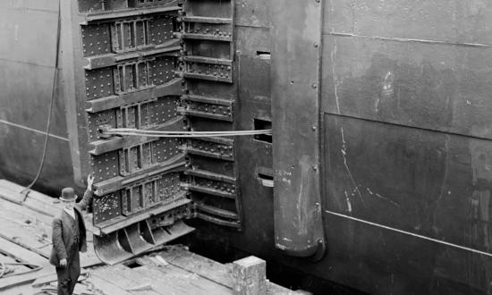 The Lacoste Ship Brake is shown, looking aft, installed on the USS Indiana (BB-1) at Philadelphia on 1 April 1910. The simple door configuration was complicated by the curvature of the battleship’s hull.