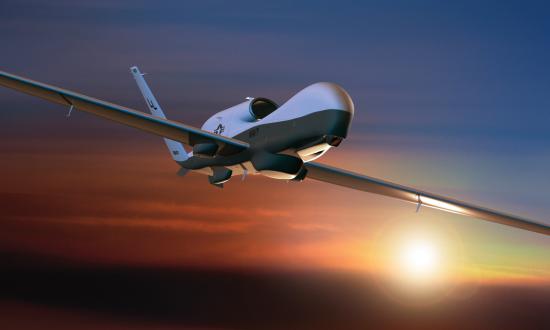 Concept art of an MQ-4C Triton UAV at sunset