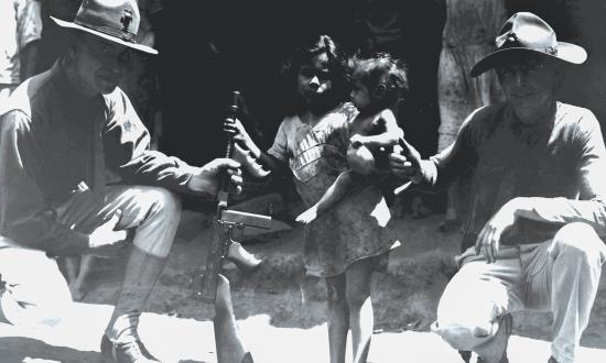 U.S. Marines posing with Nicuraguan children