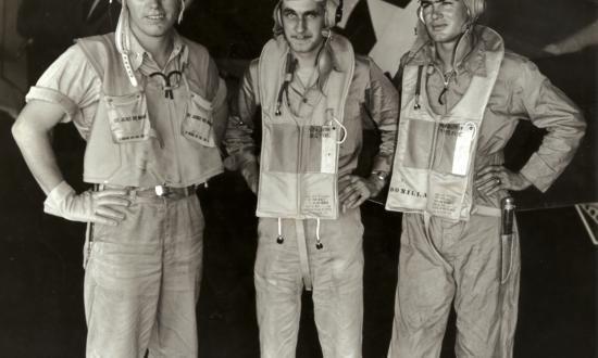 Lieutenant (junior grade) William “Mac” McCarthy (center); the author, Aviation Ordnanceman Second Class Paul Bonilla (right); and Lieutenant (junior grade) Richard Johnson are pictured back on board the USS Lexington after being shot down and rescued. 