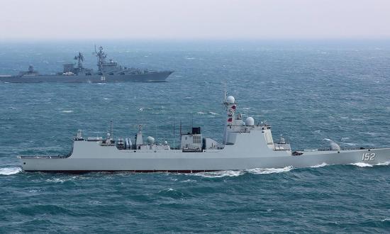 A revanchist Russia likely would rather fight the United States far away from Moscow. Joining a Chinese war to take Taiwan could give it that opportunity. Here, Russian cruiser Varyag (background) joins Chinese destroyer Jinan during an exercise.