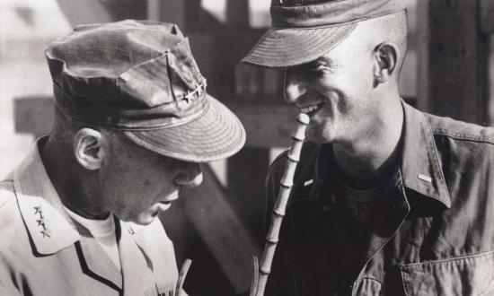 Lieutenant General Victor Krulak, left, with his son, the future Commandant of the Marine Corps Charles Krulak as a young officer in an undated photograph.