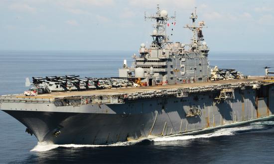 A reader suggests refitting and recommissioning the former Peleliu (LHA-5), shown here just a few months before her decommissioning in 2015, as an amphibious command ship to host U.S. Africa Command’s presence around the African continent.
