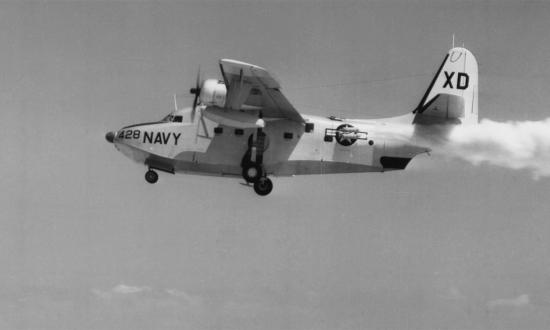 A Grumman HU-16 Albatross tests a Jet-Assisted Take-Off (JATO) system in this undated photograph. A reader shares a story of a land-based—that is, non-amphibious—Albatross mission from Guam several years after the aircraft was decertified for water operations.