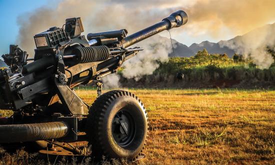 An M119 Howitzer night live fire certification. Its 105-mm rounds can be very effective as close-in direct fire or indirect fire out to almost 20,000 meters.