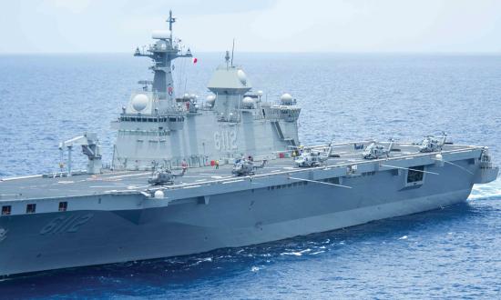 The Marado is pictured here with two Super Lynx and three Seahawk helicopters on the flight deck.