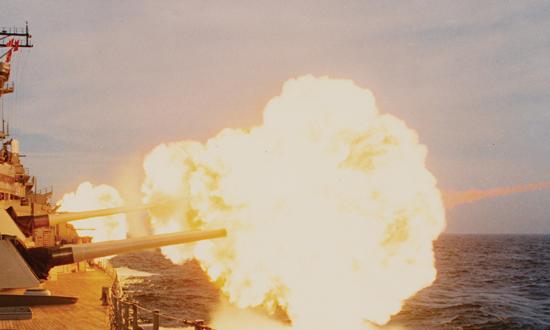 The USS Missouri (BB-63) fires her Mark 7 16-inch/50-caliber gun