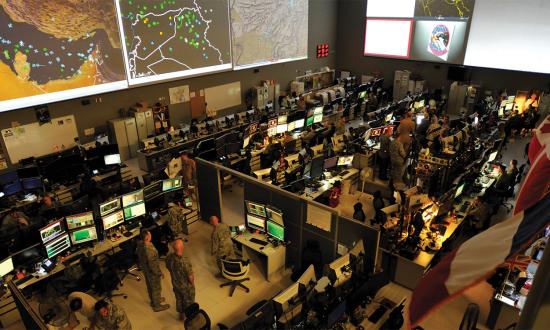 The combined air operations center (AOC) at Al Udeid Air Base, Qatar, comprises a joint and coalition team that controls day-to-day combined air and space operations and provides rapid reaction, positive control, coordination, and deconfliction of weapon systems. AOCs are systems of systems with doctrinally defined joint linkages, structures, and processes intended to produce synchronized joint effects across the operational and tactical levels. AOCs have been diligently and iteratively designed around join