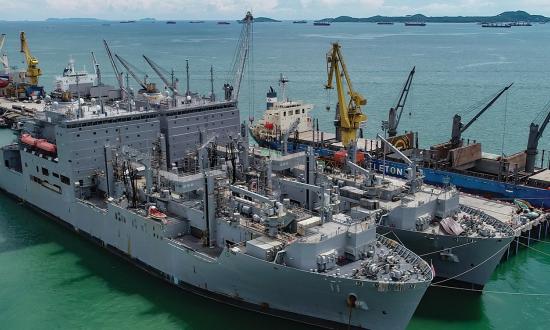 The USNS dry cargo ships Richard E. Byrd (T-AKE-4) and Washington Chambers (T-AKE-11) at a Unithai facility in Thailand. Unithai holds one of the 46 master ship repair agreements issued in the western Pacific that allow private shipyards to perform work on U.S. Military Sealift Command ships—but not commissioned U.S. warships.