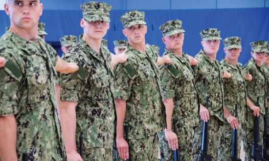 Officer candidates in Newport, Rhode Island, practice drill and ceremony. The Navy today, just as with society at large, is rife with unconscious bias that denies people of color the wider margins of error and smoother career progression their white contemporaries enjoy.