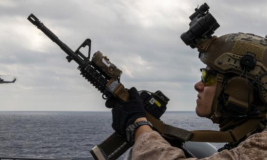 A U.S. Marine with maritime raid force, 31st Marine Expeditionary Unit posts security during a visit, board, search, and seizure exercise aboard the USS Miguel Keith (ESB-5) off the coast of Okinawa, Japan, in February 2023. Force selection, interception tactics, and the correct employment of maritime geography are critical elements of a blockade’s conduct.