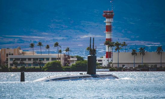 The USS Cheyenne (SSN-773) is shown here departing Joint Base Pearl Harbor–Hickam for a regularly scheduled Indo-Pacific deployment. 