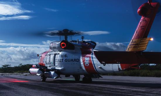 An MH-60T Jayhawk on the runway in Great Inagua, Bahamas. The Coast Guard plans to grow its fleet of MH-60Ts from 48 to 127, but the first phase of that growth is expected to include just 36 aircraft.