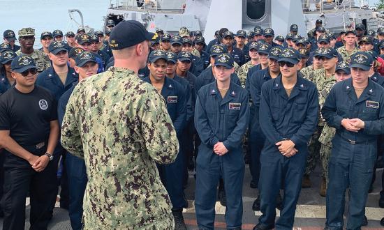 The commanding officer of the USS Halsey (DDG-97) speaks to the crew during an all-hands call. A captain must impart a fundamental sense of purpose: to prepare for missions at sea, the most important of which is to defeat other navies.