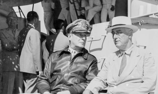 President Franklin Roosevelt sitting with General Douglas MacArthur and Admiral Chester Nimitz