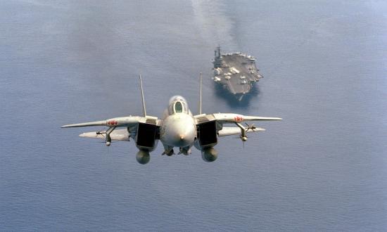 ront air-to-air view of an F-14A Tomcat aircraft from Fighter Squadron 102 (VF-102), just after taking off from the aircraft carrier USS AMERICA (CV-66)