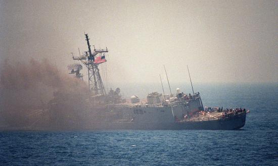 A port quarter view of the guided missile frigate USS STARK (FFG-31) listing to port after being struck by an Iraqi-launched Exocet missile