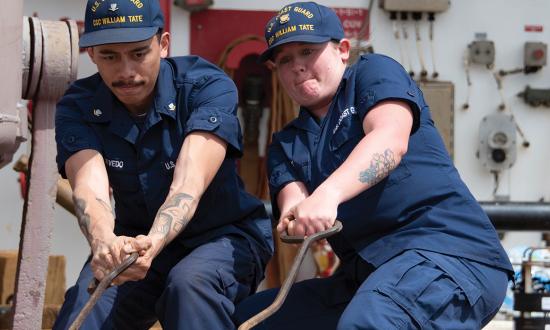 Crew members working on the Coast Guard cutter William Tate