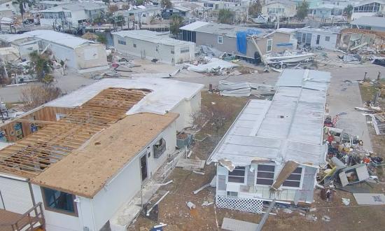 A Coast Guard drone examines damage after Hurricane Ian in October 2022. Already used in land-based search-and-rescue missions, drones could be used to spot persons in the water and locate vessels in distress, debris fields, and/or pollution.
