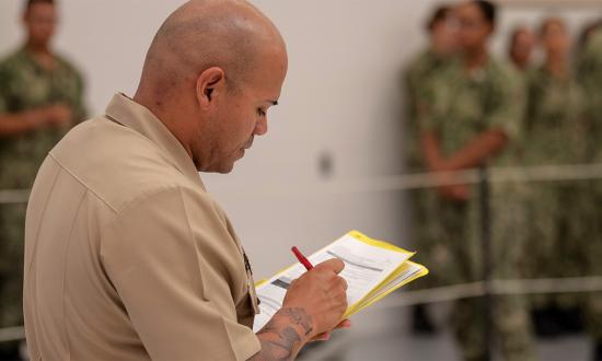 A chief boatswain’s mate evaluates recruits during basic seamanship training at Recruit Training Command (RTC), Great Lakes, Illinois. Training to develop character and instill technical competence starts at RTC and continues throughout a sailor’s career. Chiefs help to promote sailors by assisting the commanding officer to provide effective documentation of performance.