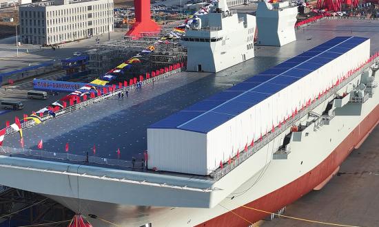 The Sichuan—the first Type 076 new-generation amphibious assault ship—was launched in Shanghai in December. It is the first such ship in any navy to be equipped with an electromagnetic catapult, which in this image is hidden by the long shed.