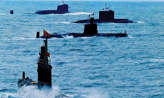 A Chinese navy nuclear submarine takes part in a drill with other submarines in Qingdao in east China's Shandong province. China declassified its first fleet of nuclear submarines for the first time on Sunday, Oct. 27, 2013