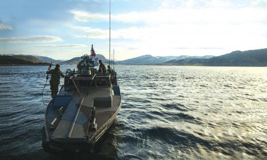 U.S. Marines and Norwegian Coastal Ranger Commandos on a CB90 fast-assault craft during Exercise Platinum Ren at Fort Trondenes, Harstad, Norway, in May 2018.