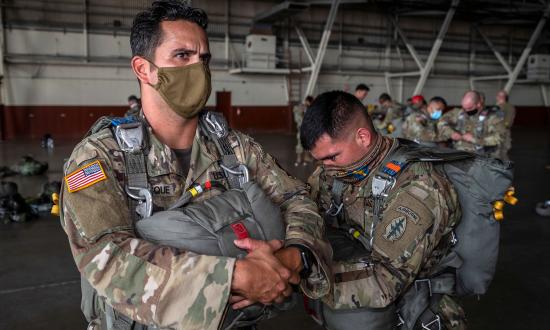 U.S. Army Special Forces prepare for a parachute drop.