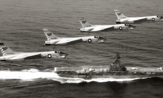 F-8 Crusaders of the “Fighting Checkmates” of Fighter Squadron (VF) 211 in flight over the carrier USS Hancock. VF-211 had a reputation as MiG killers and, in 1968, Lieutenant (junior grade) Gary W. Williams was eager to join their ranks.