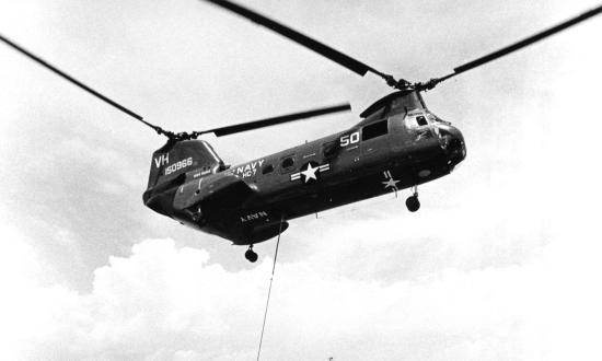 USS Repose (AH-16) receives vertical replenishment from a Navy CH-46A Sea Knight helicopter