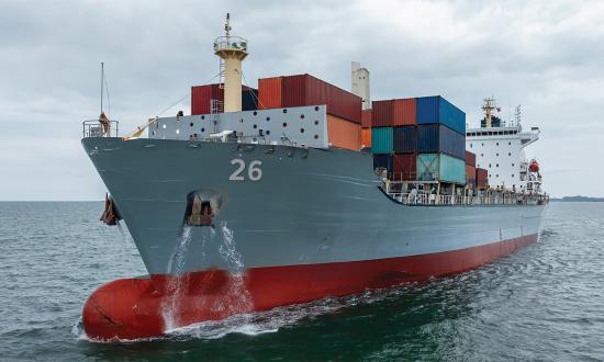 A concept showing a container ship as it might look after  conversion to a warship with containerized missiles and drones weapons, including the missile launcher shown amidship.