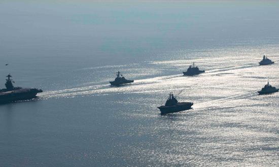 The USS Gerald R. Ford (CVN-78) and Normandy (CG-60) sail in formation with allied ships during Neptune Strike in July 2023. The 1980s Maritime Strategy allowed the Navy to prioritize how it operated, the kinds of ships and aircraft it built, and how senior leaders advocated for resources. There are many lessons for today’s Sea Services. 