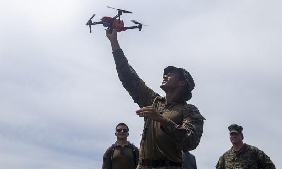 Marines with Task Force Koa Moana, I Marine Expeditionary Force, handle a drone for an environmental survey. The United States should consider how Replicator fits into allied str