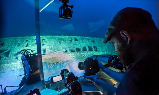 Joe Hoyt documents damage to U-576 