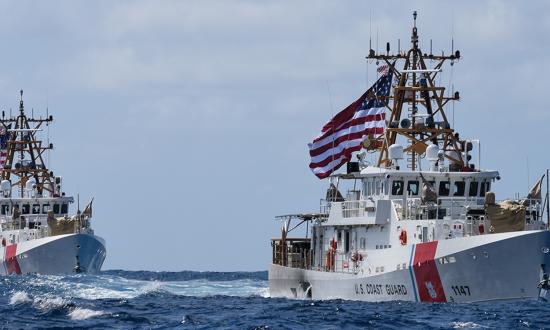 The fast response cutters USCGC Clarence Sutphin Jr. (WPC-1147) and John Scheuerman (WPC-1146) sail across the Atlantic Ocean in June 2022.