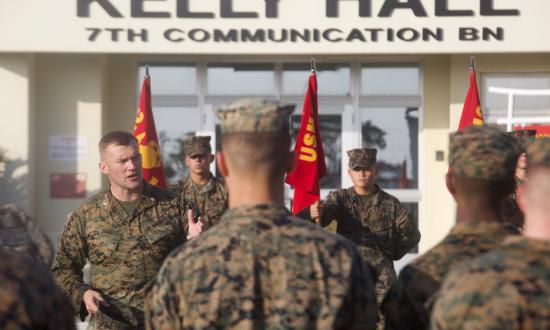 U.S. Marine Lt. Col. Michael Hlad addresses the Marines of 7th Communication Battalion following a 6.1 mile hike commemorating 7th Comm. Bn.’s 61st anniversary aboard Camp Hansen, Okinawa, Japan, Oct. 25, 2018.