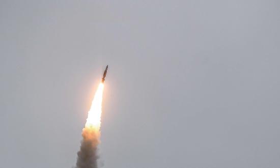 Arleigh Burke-class guided-missile destroyer USS Donald Cook (DDG-75) fires a Standard Missile 3