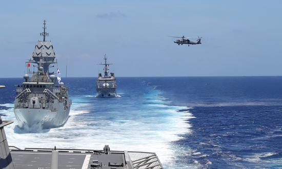 Interoperability with allies and partners is a major part of deterrence in the western Pacific. In April 2024, the Royal Australian Navy frigate HMAS Warramunga (center) and the French Navy frigate FS Vendémiaire (distant) sailed with the Independence-variant littoral combat ship USS Mobile (LCS-26) in the South China Sea. 
