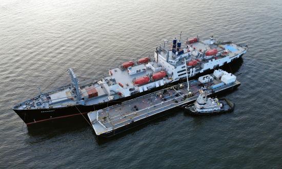 The TS Kennedy en route to Cape Cod, with cadets on board for at-sea training, takes on bunkers from a barge in New York Harbor.