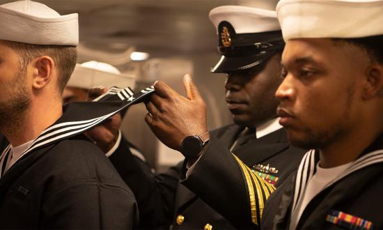 A uniform inspection on the mess decks aboard USS Boxer (LHD-4). Uniforms are a critical part of the military, and they must be safe, functional, comfortable, professional, and reflect the fleet that wears them. 