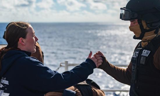 An ensign fist bumps a chief petty officer on the deck of the USCGC James (WMSL-754). A pump up speech doesn’t need to always come from the top, or even need to be a speech. Being a positive leader and sharing high fives and fist bumps with the crew are underrated tools in keeping a team motivated.
