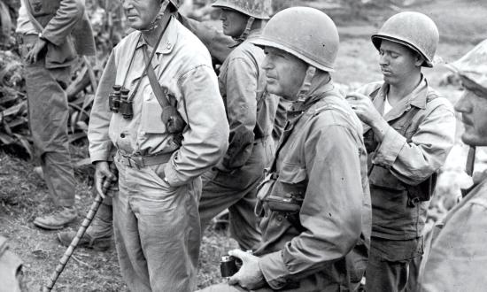 Lieutenant General  Lemuel Shepherd (left, as a major general overlooking Naha on Okinawa) noted the Marine Corps’ contributions to amphibious operations, but just as important is its role as a “ready-to-act military organization, responsive . . . to the President’s call to meet the crises which occur in both peace and war.”