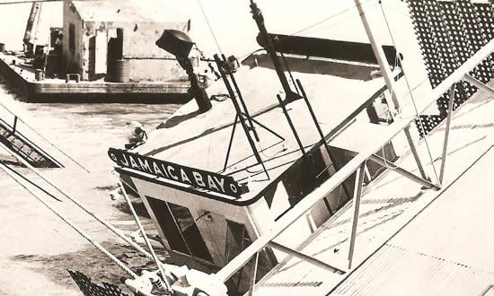In January 1967,  the Viet Cong mined the dredge Jamaica Bay, trapping one of her civilian mariners in the mangled hull. It would take a heroic effort to free him from the rapidly sinking craft.