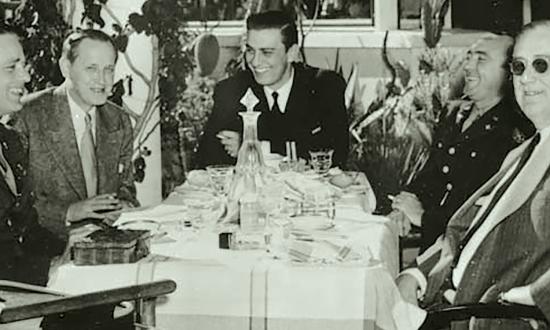 President Franklin D. Roosevelt at lunch with his son Elliott Roosevelt, Harry Hopkins, Franklin D. Roosevelt Jr., and George Durno during the 1943 Casablanca Conference.