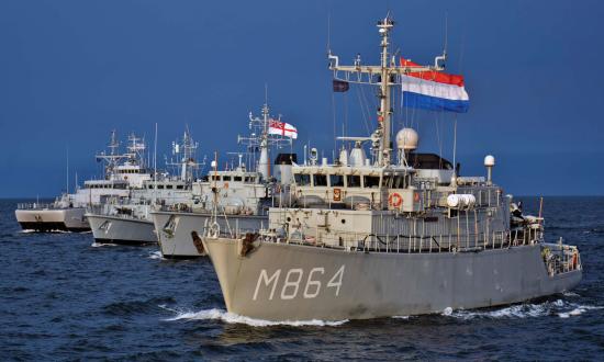 The Dutch minehunter HNLMS Willemstad (M-864) transits in formation during maneuvering exercises with Standing  NATO Mine Countermeasures Group 1 and Estonian Navy ships, all participating in international exercises with allied nations in the region.