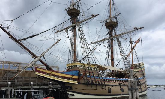 Visitors can see the Mayflower II and her painted sloping sides from the State Pier on Water Street.