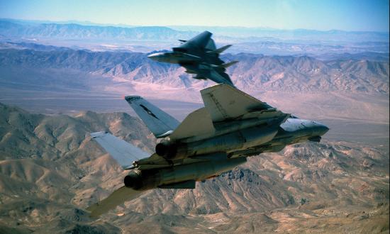 Two F-14 Tomcats go “beak to beak” in the skies near Fallon, Nevada