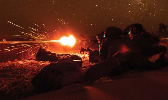 Marines with Marine Rotational Force—Darwin fire an M240B medium machine gun during training with Australian forces in August 2023.