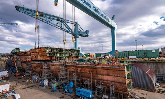 The USS John F. Kennedy (CVN-79), which launched in December 2019, while under construction at the Newport News Shipyard. The U.S. Navy must build ships now so it is ready for future battles.