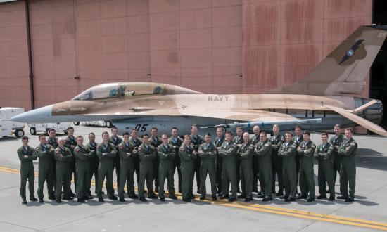 TOPGUN staff in front of a two-seat F-16N at Naval Air Station Fallon, Nevada